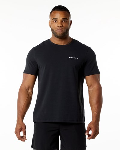 Alphalete Relaxed Fit Tee Mustat | 063JBZRFG