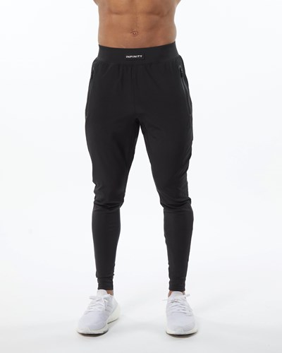 Alphalete Woven 4-Way Stretch 29" Pant Blackout | 264VLMOQN