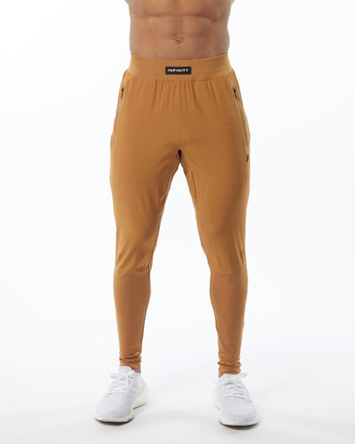 Alphalete Woven 4-Way Stretch 29" Pant Chestnut | 645QSZGNR