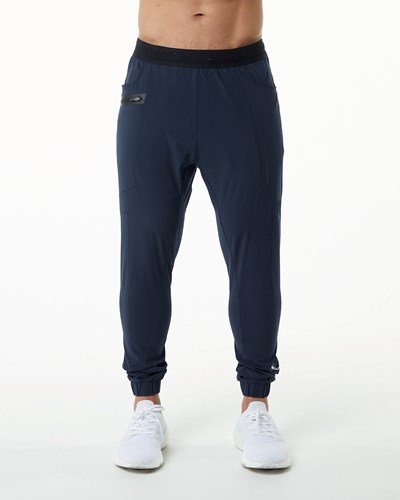 Alphalete Woven 4-Way Stretch 29" Pant Laivastonsininen | 145WORCPI