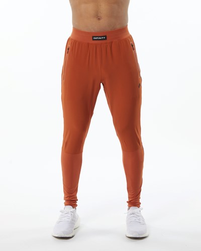 Alphalete Woven 4-Way Stretch 29" Pant Sour Tangerine | 290SKRFJD