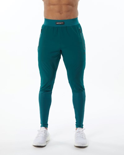 Alphalete Woven 4-Way Stretch 29" Pant Velvet Teal | 093WQJHOP