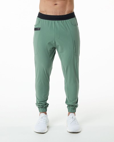Alphalete Woven 4-Way Stretch 29" Pant Vihreä | 423IVUSPC