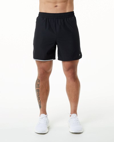 Alphalete Woven 4-Way Stretch 5" Lyhyt Mustat | 389JFODRL