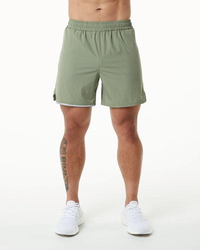 Alphalete Woven 4-Way Stretch 5" Lyhyt Vaaleanoliivinvihreä | 482SNTWCM